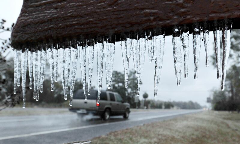 Icicles hang from the "Welcome to Hilliard sign" in Hilliard, Florida. Bob Self / The Florida Times-Union via AP