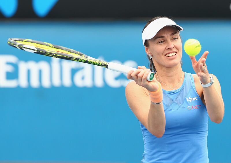 MELBOURNE, AUSTRALIA - JANUARY 21:  Martina Hingis of Switzerland in her first round doubles match against Mariana Duque Marino of Colombia and Teliana Pereira of Brazil during day four of the 2016 Australian Open at Melbourne Park on January 21, 2016 in Melbourne, Australia.  (Photo by Scott Barbour/Getty Images)