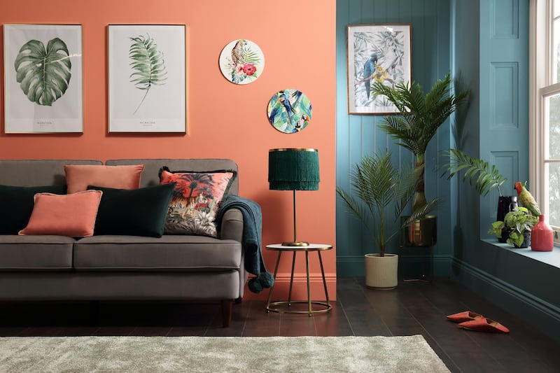 Coral, palm tree prints and wood for a soft tropical vibe. Photo: Furniture Choice Ltd
