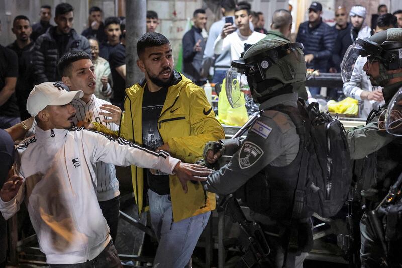 Objects were thrown at Israeli police, who responded with tear gas and stun grenades. AFP