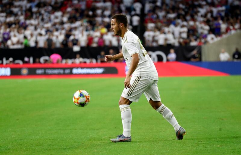 Hazard looks to make a pass during the match in Houston. Reuters