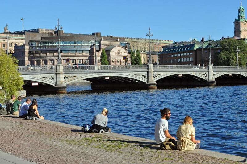 Taking time out by the water overlooking Gamla Stan in Stockholm. (Photo by Rosemary Behan)