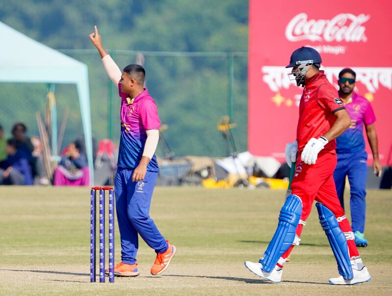 Ayaan Afzal Khan of UAE celebrates a wicket.
