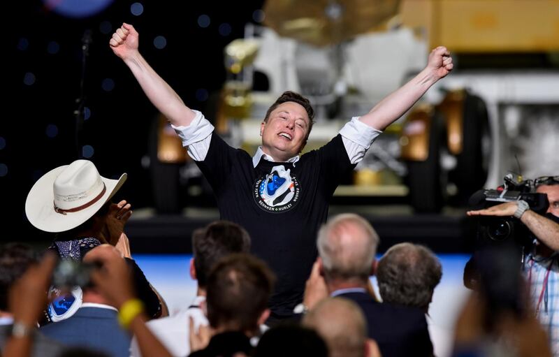 SpaceX chief executive and owner Elon Musk celebrates after the launch of a SpaceX Falcon 9 rocket and Crew Dragon spacecraft on Nasa's SpaceX Demo-2 mission to the International Space Station from Nasa's Kennedy Space Centre in Cape Canaveral, Florida. Reuters