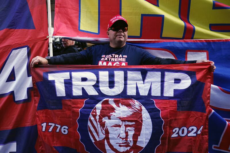 A Donald Trump supporter near Trump Tower in New York. EPA