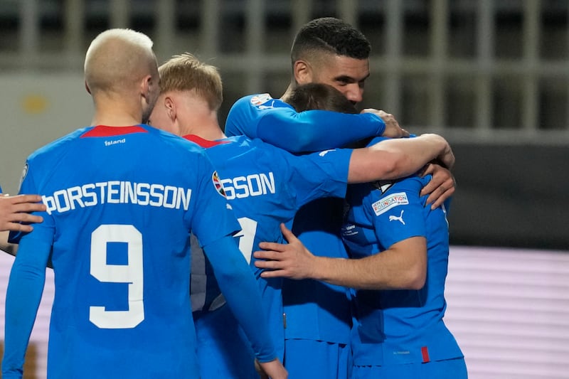 Albert Gudmundsson celebrates with his teammates after scoring Iceland's fourth goal. AP