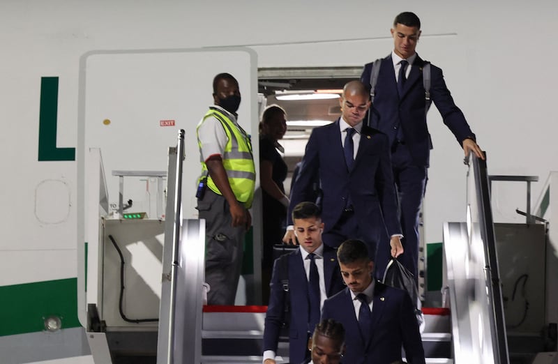 Portugal's Cristiano Ronaldo, Pepe and other team members after arriving at the Hamad International Airport in Doha. AFP