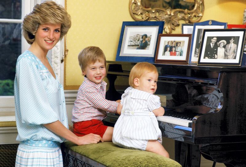 UNITED KINGDOM - OCTOBER 04:  Diana, Princess of Wales with her sons, Prince William and Prince Harry, at the piano in Kensington Palace  (Photo by Tim Graham Photo Library via Getty Images)