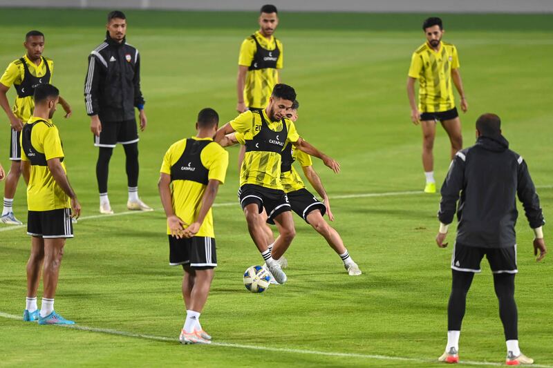 The UAE football team train at the Abdullah bin Khalifa Stadium in Doha ahead of their 2022 World Cup play-off against Australia on Tuesday. Photo: UAE FA