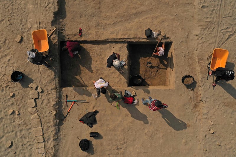 Members of a French-Iraqi archaeological expedition work on a dig at the site of the Sumerian city-state of Larsa, in the Qatiaah area of Iraq's southern province of Dhi Qar near the city of Nasiriyah. All images by AFP