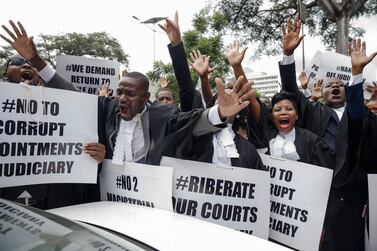Lawyers of the Law Society of Zimbabwe bar association take part in a "March for Justice" in Harare. AFP