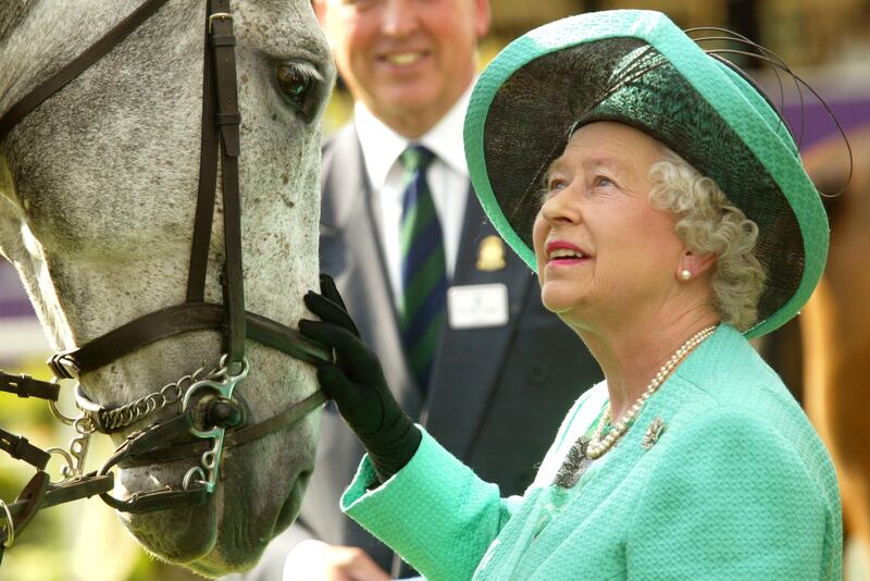 Queen Elizabeth II attends the third day of the Royal Windsor Horse Show at Home Park on May 15, 2004, in Windsor, England. Getty Images