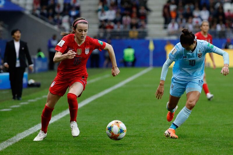 United States' midfielder Rose Lavelle, left, runs with the ball. AFP
