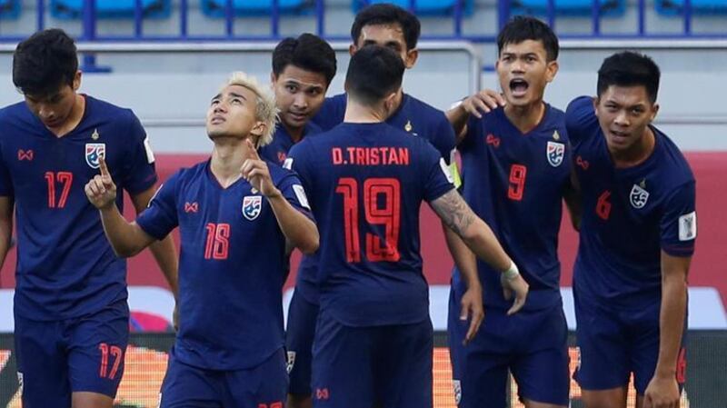 Thailand celebrate their 1-0 win over Bahrain in the Asian Cup Group A game at Al Maktoum Stadium in Dubai. All photos by Chris Whiteoak / The National