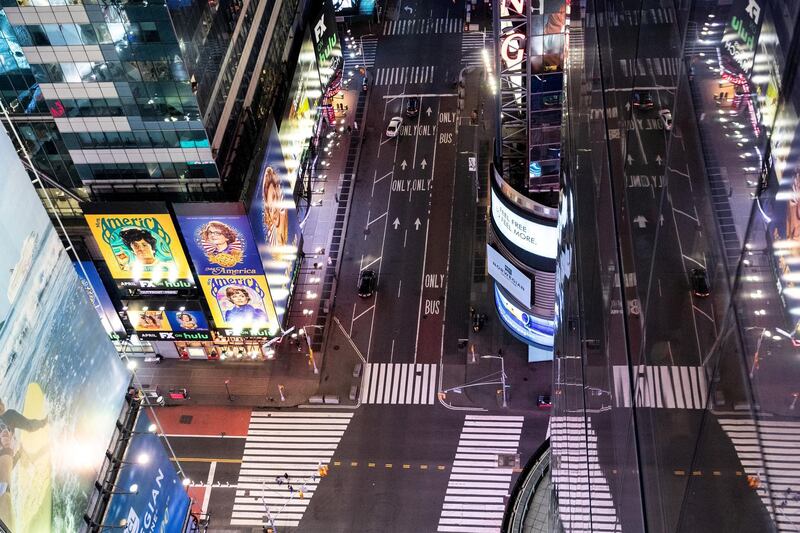 An empty Times Square is seen on the street following the outbreak of coronavirus disease (COVID-19), in New York City, U.S., March 18, 2020. REUTERS/Jeenah Moon