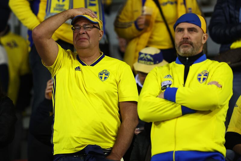 Swedish fans react at half-time as the match against Belgium is abandoned. Getty Images