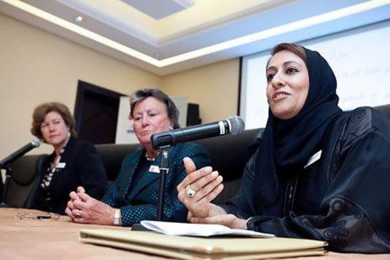 Fatima Al Jaber, a founding member of the local chapter of Women Corporate Directors, speaks at the launch event. Silvia Razgova / The National