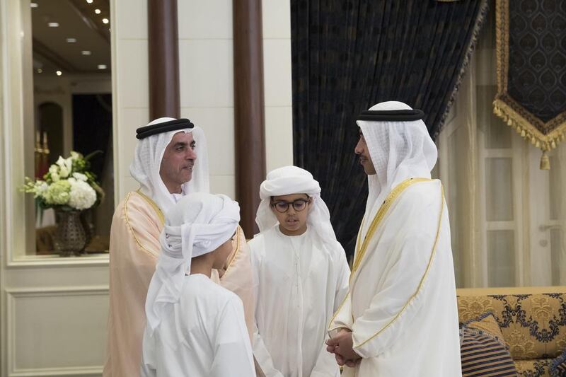 Sheikh Saif bin Zayed, Deputy Prime Minister and Minister of Interior, left, Sheikh Zayed bin Abdullah bin Zayed Al Nahyan, second left, Sheikh Mohamed bin Abdullah bin Zayed, third left, and Sheikh Abdullah bin Zayed, Minister of Foreign Affairs and International Cooperation, right, at Mushrif Palace. Mohamed Al Hammadi / Crown Prince Court - Abu Dhabi