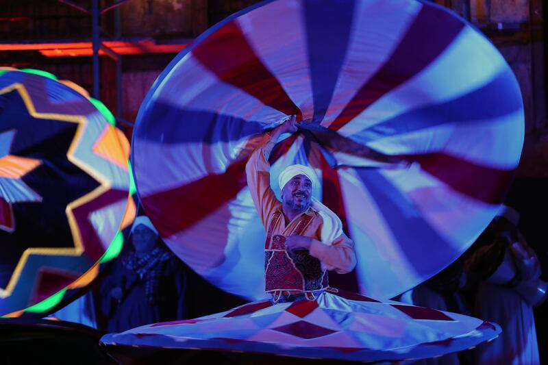Tanoura Dance Troupe performing during Ramadan at the Ghouri complex in Cairo. EPA.
