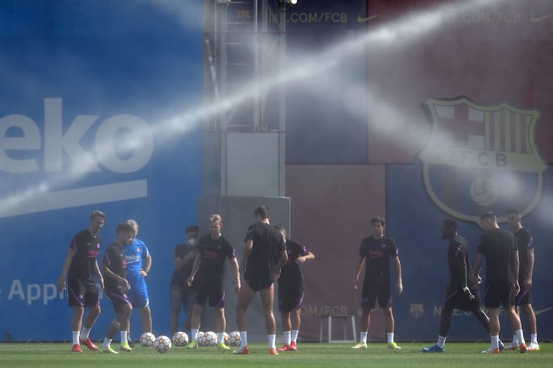 Barcelona players during training. AFP