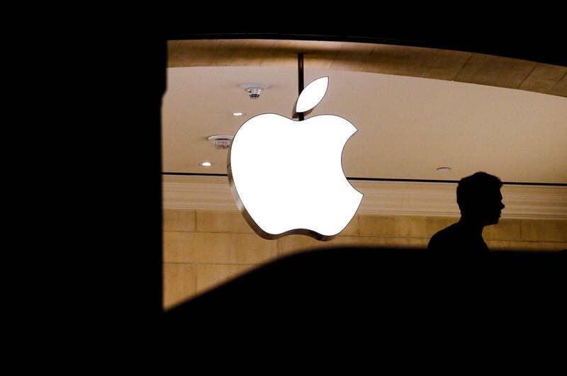 epa06923900 (FILE) - People walk past an Apple logo at an Apple store in New York, New York, USA, 01 August 2018 (issued 02 July 2018).  After positive earnings report, shares of Apple surged making it the first company in history to reach a market value of one trillion US dollars.  EPA/JUSTIN LANE