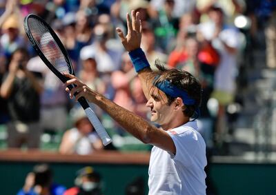 Roger Federer, of Switzerland, waves to fans after winning his quarterfinals match against Hubert Hurkacz, of Poland, at the BNP Paribas Open tennis tournament Friday, March 15, 2019, in Indian Wells, Calif. (AP Photo/Mark J. Terrill)