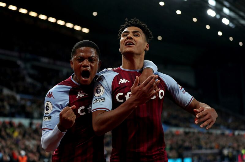 Aston Villa's Ollie Watkins celebrates scoring the opening goal with Leon Bailey. AP