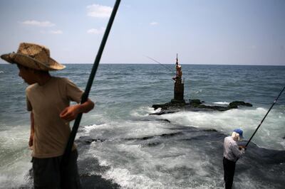 Beirut, Lebanon - July 13, 2008 - Men fish on the mediterranean sea. (Nicole Hill / The National) *** Local Caption ***  NH Shatila 13.jpgNH Shatila 13.jpg