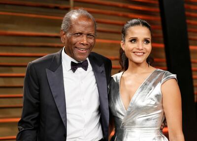 Poitier and his daughter Sydney Tamiia Poitier arrive at the 2014 Vanity Fair Oscars Party in West Hollywood, California, in March 2014. Reuters