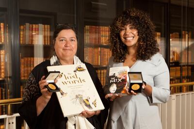 Elizabeth Acevedo and Jackie Morris with the Carnegie Medal and the Kate Greenaway Medal