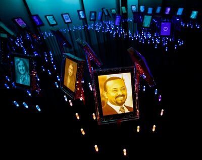 epa07971382 YEARENDER 2019 OCTOBER
A picture of Ethiopian Prime Minister Abiy Ahmed is displayed together with former Nobel Peace Prize winners at the Nobel Peace Center in Oslo, Norway, 11 October 2019. Ethiopia's Prime Minister Abiy Ahmed was awarded with the 2019 Nobel Peace Prize, the Norwegian Nobel Committee announced 11 October 2019.  EPA/Stian Lysberg Solum NORWAY OUT