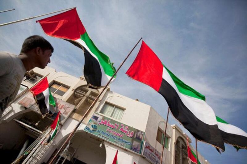 UAE flags available for purchase in the Al Hili car decoration souk in Al Ain. Prices range between Dh200 to D700 depending on size. Antonie Robertson / The National