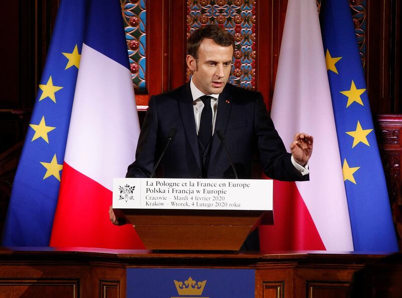 French President Emmanuel Macron delivers a speech to students and intellectuals at the Jagiellonian University for a lecture on the future of a united Europe in Krakow, Poland, Tuesday, Feb. 4, 2020.(AP Photo/Czarek Sokolowski)