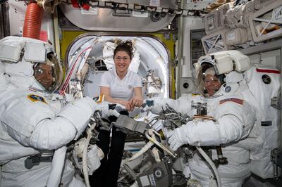 epa07464211 A handout photo made available by the NASA shows NASA astronaut Christina Koch (C) assists fellow astronauts Nick Hague (L) and Anne McClain (R) in their US spacesuits shortly before they begin the first spacewalk of their careers, aboard the International Space Station (ISS), 22 March 2019 (issued 26 March 2019). The NASA on 26 March 2019 said it has cancelled the first all-female spacewalk which was scheduled for 29 March 2019, citing spacesuit issues.  EPA/NASA / HANDOUT  HANDOUT EDITORIAL USE ONLY/NO SALES