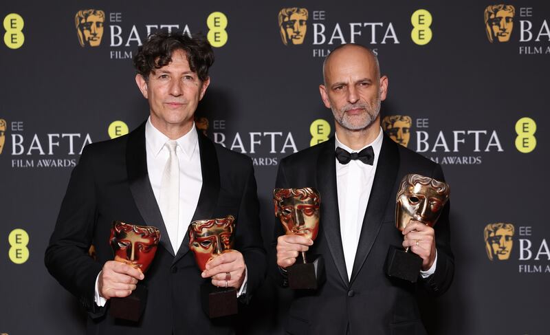 Jonathan Glazer and James Wilson won the Best Film Not in the English Language award for The Zone of Interest at the Baftas. EPA