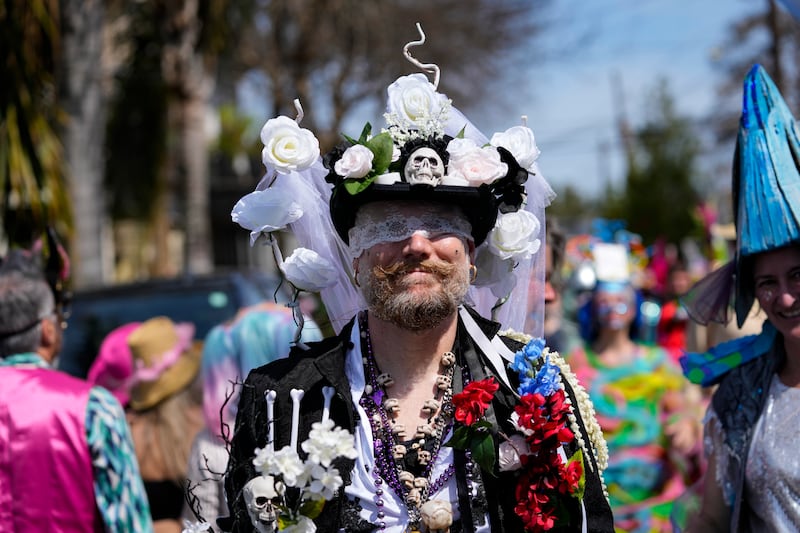 Fat Tuesday marks the last day of Carnival season, when costumed visitors flock to parades and parties citywide. AP