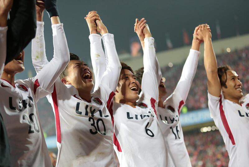 Kashima Antlers players celebrate after winning the Asian Champions League. Getty Images