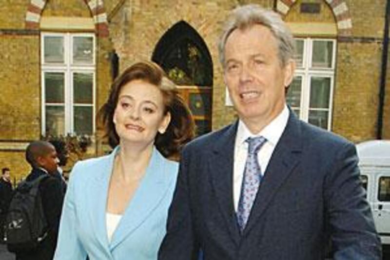 Former prime minister Tony Blair with his wife Cherie, who is to be investigated over a ruling she made as a judge.