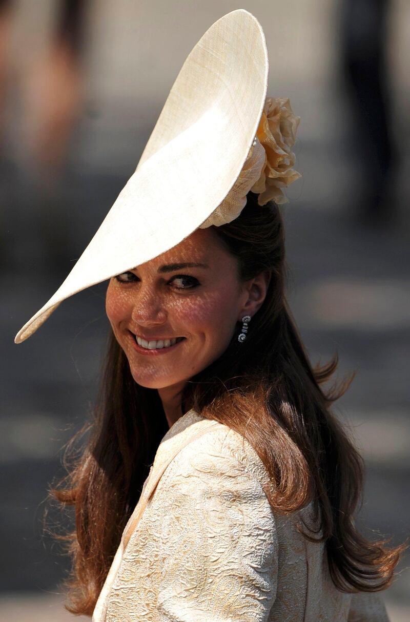 EDINBURGH, UNITED KINGDOM - JULY 30:  Catherine, Duchess of Cambridge arrives to the Royal wedding of Zara Phillips and Mike Tindall at Canongate Kirk on July 30, 2011 in Edinburgh, Scotland. The Queen's granddaughter Zara Phillips will marry England rugby player Mike Tindall today at Canongate Kirk. Many royals are expected to attend including the Duke and Duchess of Cambridge.     (Photo by Dylan Martinez - WPA Pool/Getty Images) *** Local Caption ***  120098213.jpg