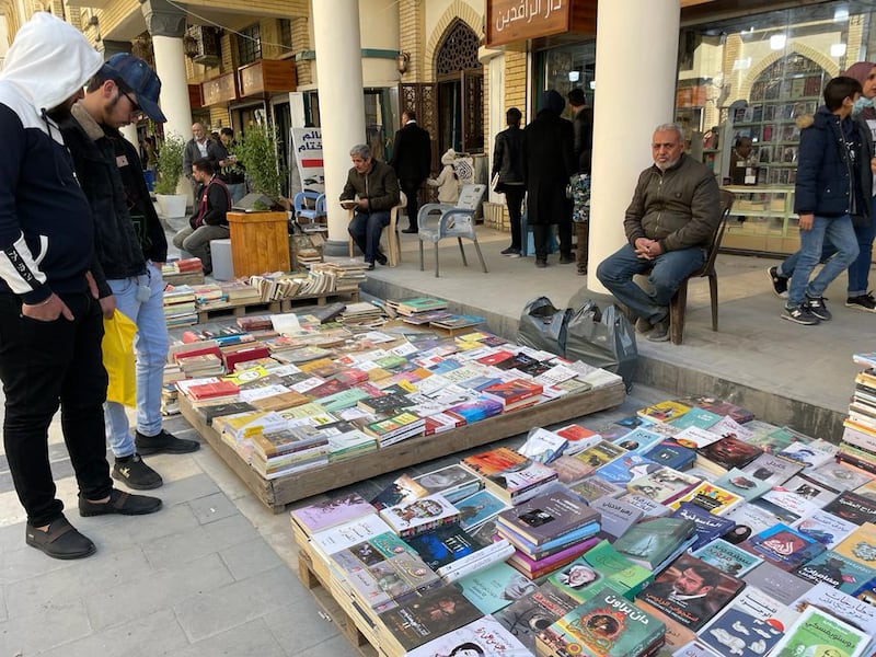 People look at books on sale.