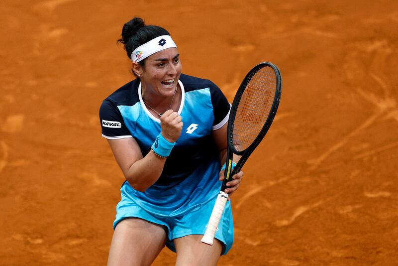 Tunisia's Ons Jabeur celebrates during her 6-2, 3-6, 6-2 victory over Belinda Bencic at the Madrid Open. Reuters