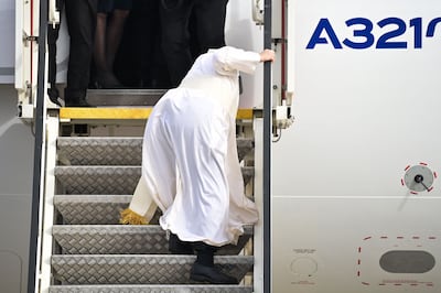 Pope Francis stumbled boarding the plane at Athens International Airport. AFP