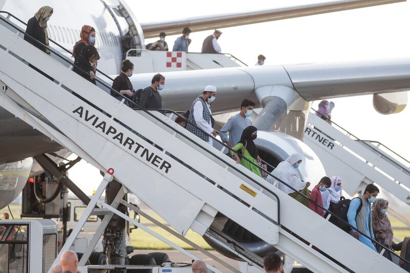 Passengers from Afghanistan arrive in Belgium. Airbnb said it will host 20,000 Afghan refugees free of charge. EPA