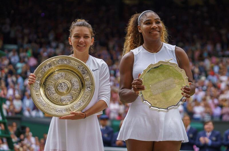 FILE PHOTO: Jul 13, 2019; London, United Kingdom; Serena Williams (USA) and Simona Halep (ROU) pose with their trophies after the women's final on day 12 at the All England Lawn and Croquet Club. Mandatory Credit: Susan Mullane-USA TODAY Sports/File Photo