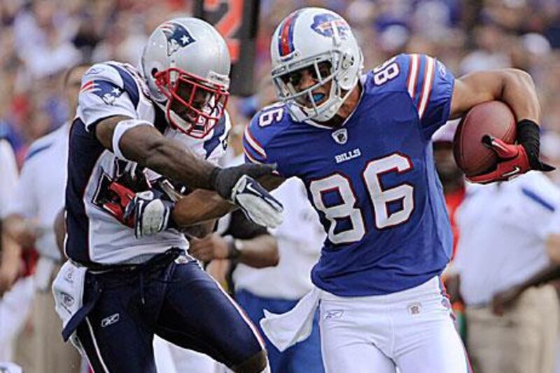 David Nelson of the Buffalo Bills, right, fends off the Patriots  Leigh Bodden during the Bills comeback win against their old rivals in the AFC.