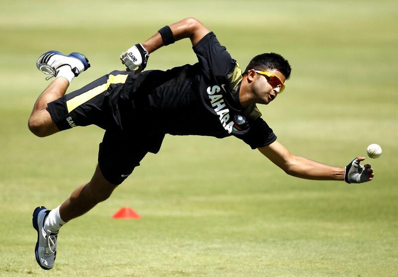 India's Suresh Raina takes part in a training session. Siphiwe Sibeko / Reuters