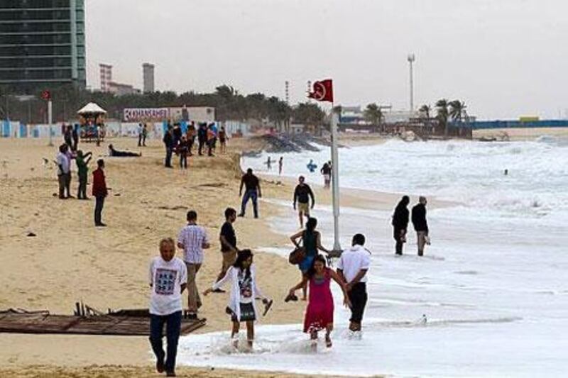 Beachgoers have been warned to look out for red flags that indicate weather conditions are not ideal for swimming.