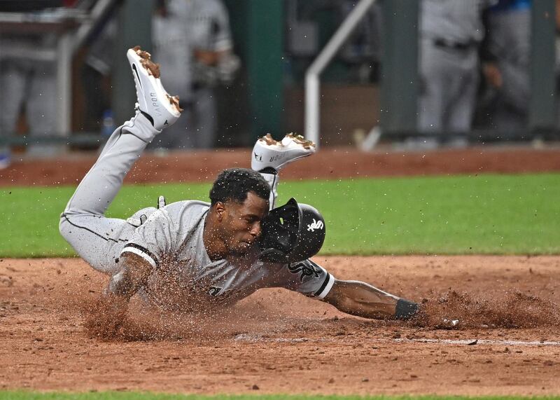 Chicago White Sox shortstop Tim Anderson dives home to score a run against the Kansas City Royals at Kauffman Stadium in Missouri on Friday, May 7. Chicago won the game 3-0. Reuters