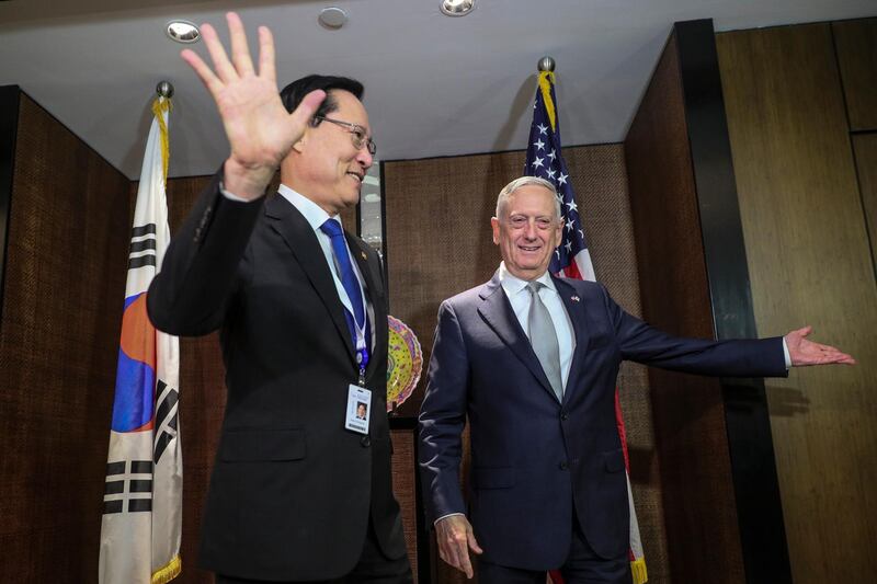 epa06779554 South Korean National Defense Minister Song Young-moo (L) and US Secretary of Defense James Mattis (R) arrive for a bilateral meeting at the sidelines of the International Institute for Strategic Studies (IISS) 17th Asia Security Summit in Singapore, 02 June 2018. The IISS Asia Security Summit is an annual gathering of defense officials in the Asia-Pacific region and is dubbed the Shangri-La Dialogue in honor of the hotel where the event is held. The summit will be held from 01 to 03 June 2018.  EPA/WALLACE WOON