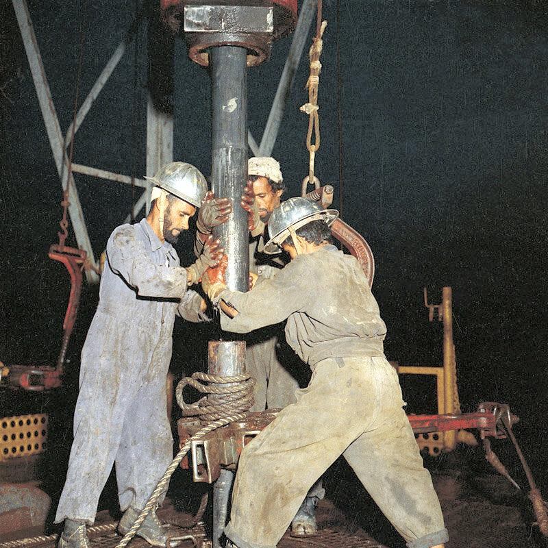 Oil workers on Murban 3 at Bab, about 80 kilometres south-west of Abu Dhabi, in 1960. Courtesy Adnoc Drilling
